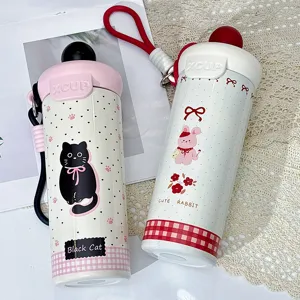 Bonita botella térmica de acero inoxidable con pajita y lindo diseño de gato y conejo.