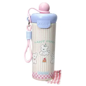 Bonita botella térmica de dibujos animados con patrón de cachorro y correa para uso diario.