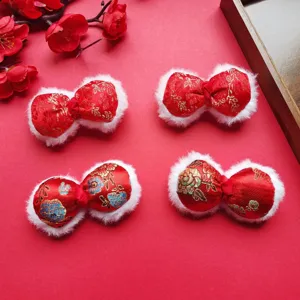 Chinese style red satin embroidered bow detail shot for festive DIY hair accessories