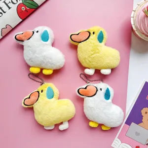Cute cartoon plush duck keychain, soft plush doll pendant for bag decoration and styling.