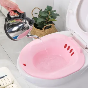 Postpartum sitz bath basin for toilet, plastic squat-free soak tub for personal care and hygiene.