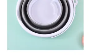 Dettaglio secchio pieghevole in plastica, catino portatile per casa, viaggi e uso esterno.