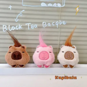 Cute capybara plush toy doll pendant with funny punk hair styling, soft stuffed animal gift.