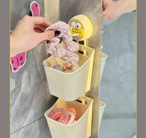 Detailansicht des niedlichen Wand-Hängekorbs mit Enten-Design für Ihre Haaraccessoires.
