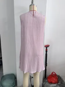Light pink sleeveless pleated mini dress back view, casual summer chic design style