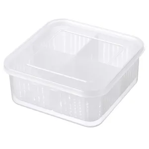 Clear plastic four-compartment kitchen storage box with lid for fresh food preservation.