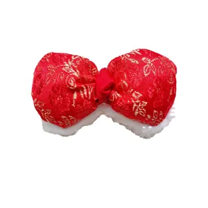 Chinese style red brocade embroidered bow with plush trim for DIY hair accessories and decor.