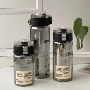 Tragbare Kunststoff Wasserflasche mit grauem Farbverlauf und grossem Fassungsvermögen für den Alltag.