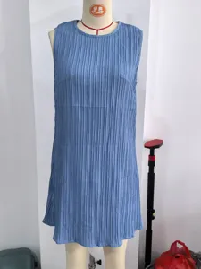 Blue sleeveless pleated mini dress featuring a classic round neck and elegant casual summer style.