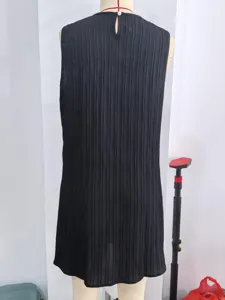 Classic black sleeveless pleated dress with a chic round neckline for summer style.