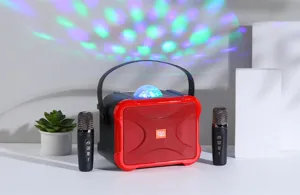 Portable wireless Bluetooth karaoke speaker with dual microphones and colorful disco lights.