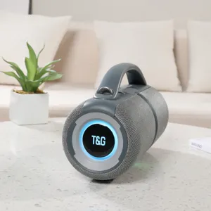 Portable wireless Bluetooth speaker with handle, outdoor mini subwoofer with RGB lights.