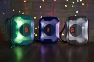 Haut-parleur Bluetooth sans fil portable avec lumières LED colorées et basses profondes.