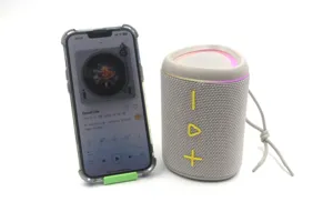 Portable wireless bluetooth speaker with fabric mesh, vibrant LED ring and great bass sound.
