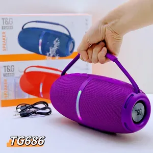 Portable wireless Bluetooth speaker outdoor detail shot with TWS pairing and deep bass sound.