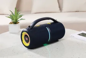 Portable wireless Bluetooth speaker featuring rich bass, colorful light rings, and a durable handle.