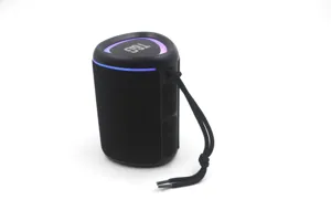 Close-up detail of the portable wireless bluetooth speaker featuring LED lights and lanyard.