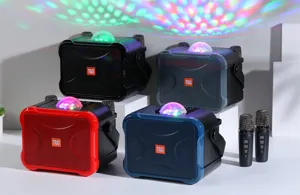 Portable wireless Bluetooth karaoke speaker with dual microphones and colorful disco lights.