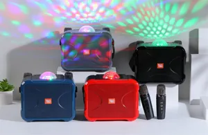 Portable Bluetooth karaoke speaker set with dual wireless microphones and colorful disco lights.