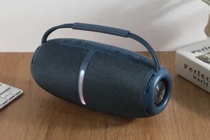Portable outdoor wireless Bluetooth speaker with heavy bass, TWS pairing and RGB light.