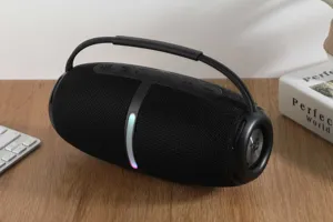 Portable wireless bluetooth speaker with deep bass, RGB light, and convenient handle design.