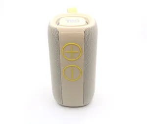 Portable bluetooth speaker detail fabric mesh beige wireless audio outdoor music gadget device