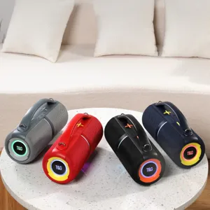 Portable Bluetooth speaker with handle, colorful LED lights, outdoor wireless subwoofer audio.
