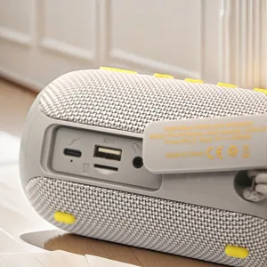 Portable wireless Bluetooth speaker with 1200mAh battery and rich audio connectivity.