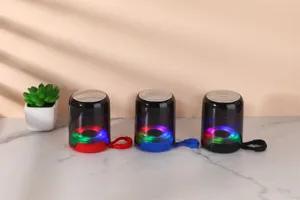 Portable wireless bluetooth speaker with colorful LED lights designed for outdoor music.