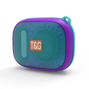 Close-up detail of the portable Bluetooth speaker, featuring colorful mesh and durable housing.