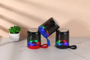 Detail view of portable wireless Bluetooth speaker with colorful LED lights and clear shell.
