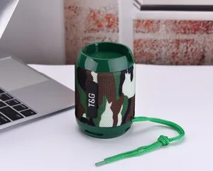 Portable wireless Bluetooth speaker with phone stand and camo design for outdoor use.