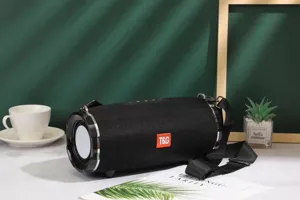 Portable fabric bluetooth speaker with dual diaphragms, heavy bass, and convenient strap for outdoor.