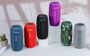 Portable wireless bluetooth speaker with colorful fabric mesh and waterproof design.
