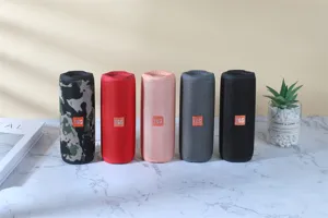Portable bluetooth speaker with waterproof design and colorful lights for outdoor parties.