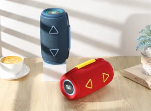 Tragbarer Outdoor Bluetooth Lautsprecher mit RGB Beleuchtung und zylindrischem Design.