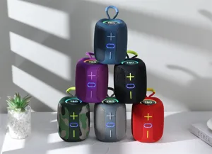 Portable outdoor Bluetooth speaker with TWS function, colorful lights and handy strap.