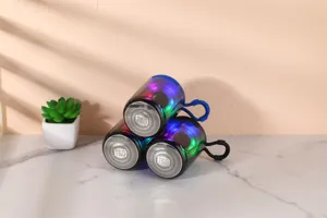 Detail view of portable wireless Bluetooth speaker with transparent LED colorful lights mesh grill.
