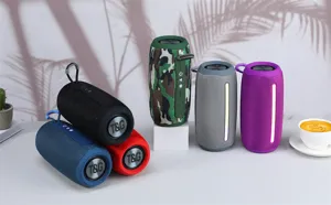 Portable Bluetooth speaker with rich bass, colorful fabric design, ideal for outdoor sports use.