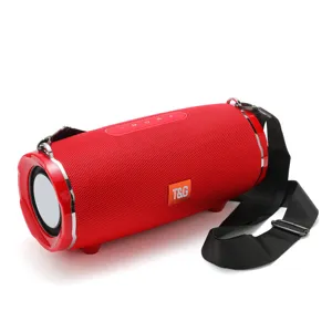 Portable wireless Bluetooth speaker with waterproof fabric mesh, deep bass and carrying strap.