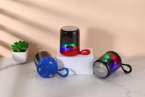 Portable wireless Bluetooth speaker with vibrant LED colorful lights and hanging strap for outdoor.