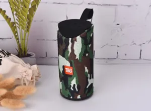 Camouflage wireless Bluetooth speaker with hanging strap and control buttons for outdoor use.