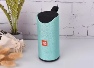 Portable wireless Bluetooth speaker with fabric mesh design, waterproof outdoor audio device.