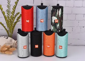 Portable wireless Bluetooth speaker with colorful fabric mesh design, deep bass and waterproof body.