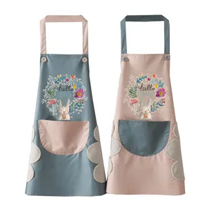 Waterproof kitchen apron featuring rabbit print, floral wreath and coral fleece hand wiping towels.