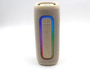 Tragbarer kabelloser Bluetooth-Lautsprecher mit bunten LED-Lichtern, beiges Design.