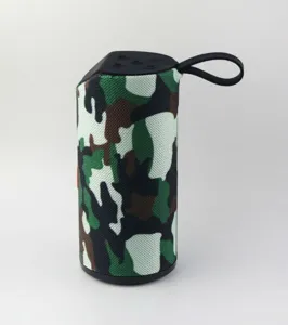 Close up view of the camouflage portable wireless bluetooth speaker with mesh fabric design.