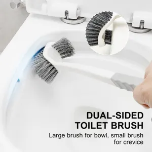 Plastic toilet brush with long handle and double-sided brush head for efficient cleaning.