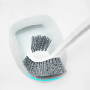Plastic toilet brush with long handle and curved design for efficient bathroom cleaning