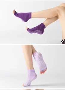 Professional non-slip yoga socks with toe separation and grip dots for dance and pilates.